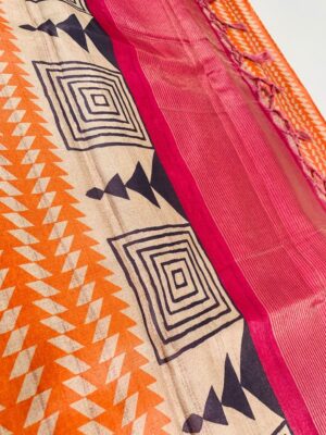 Vibrant Fancy Nilambari Tussar Saree in Orange with Geometric Design and Zari Border