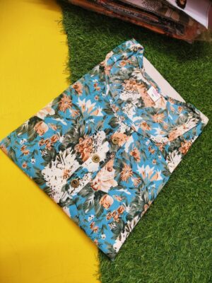 Elegant Blue Floral Silk Popcorn Kurti with Three-Quarter Sleeves and Round Neck