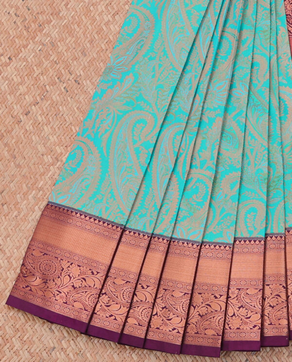 blue jacquard cotton saree with traditional border and intricate pallu