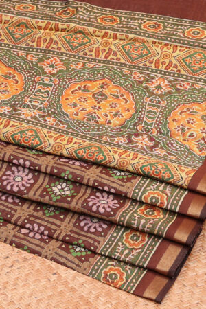 brown chanderi cotton saree with batik checks, contrast border, and intricate pallu