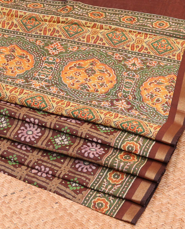 brown chanderi cotton saree with batik checks, contrast border, and intricate pallu