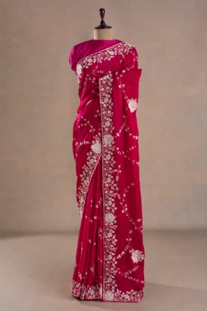 crimson red crepe saree with stone, sequins, pearl, and cutdana embroidery