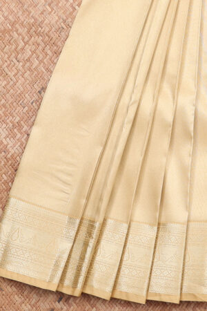 gold art silk saree with traditional border and jaal pallu