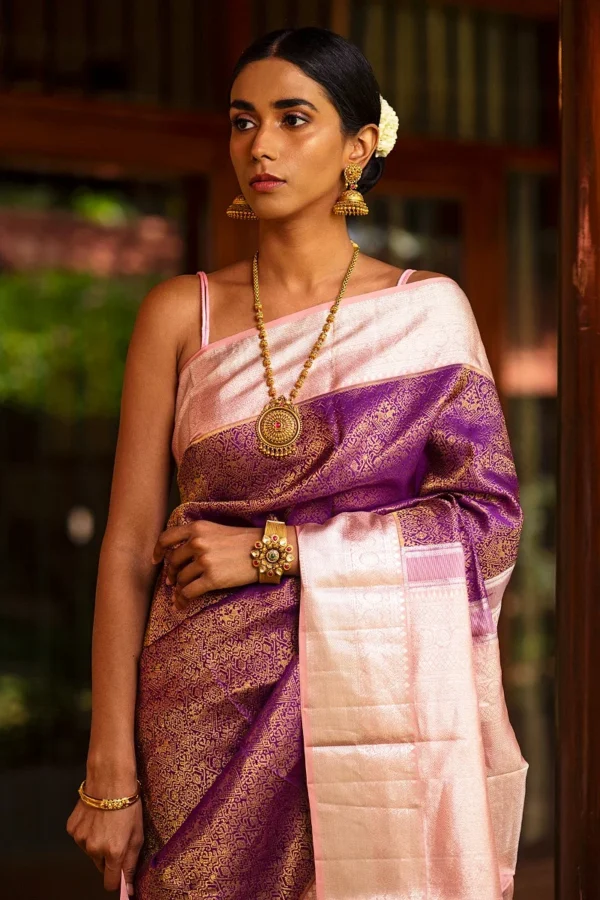 grape purple kanchipuram silk saree with pastel peach & silver zari woven border