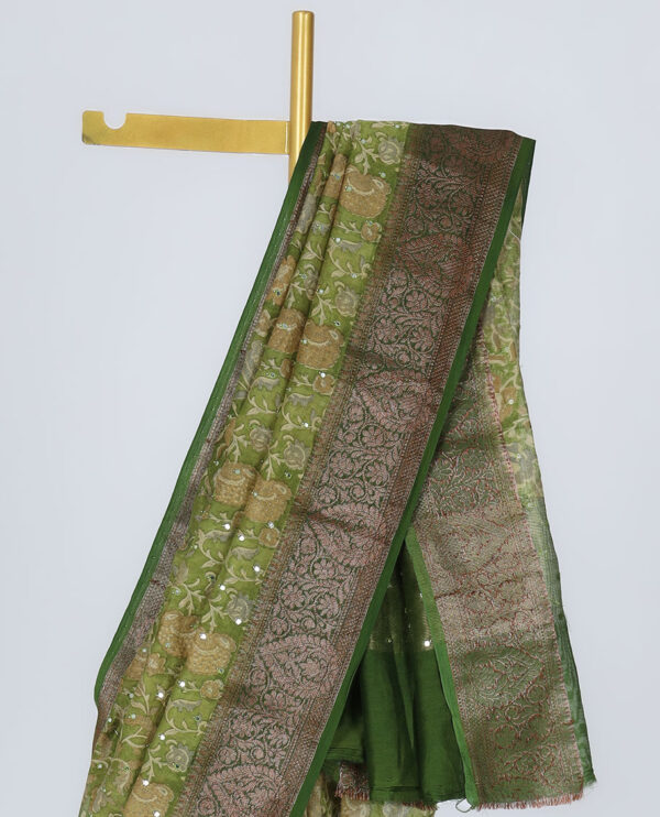 green chanderi saree with floral print, mirror embroidery, and contrast border