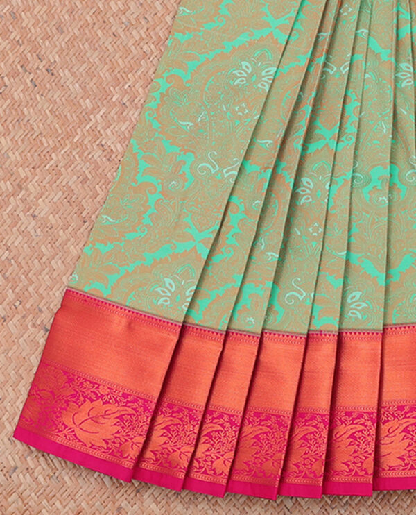 green jacquard cotton saree with traditional border and paisley pallu