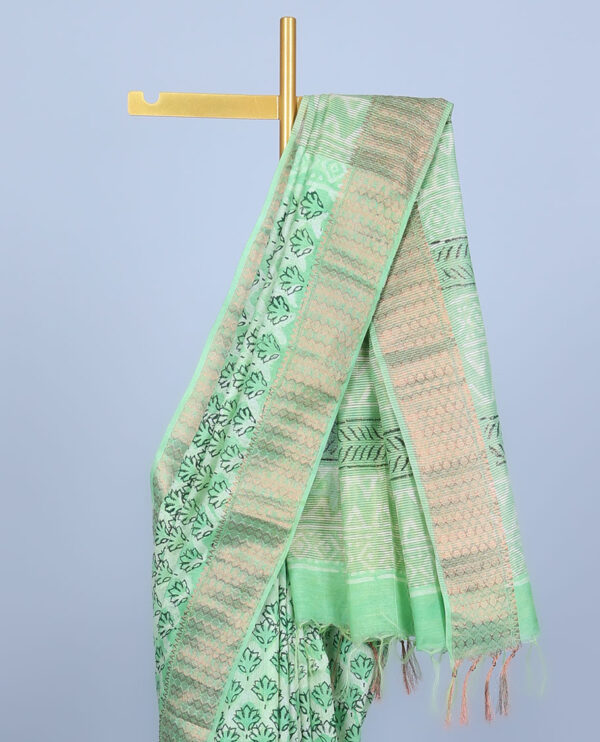 green printed chanderi cotton saree with floral buttas and diamond pattern border