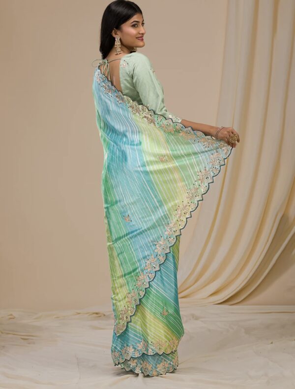 green semi crepe printed embroidered saree