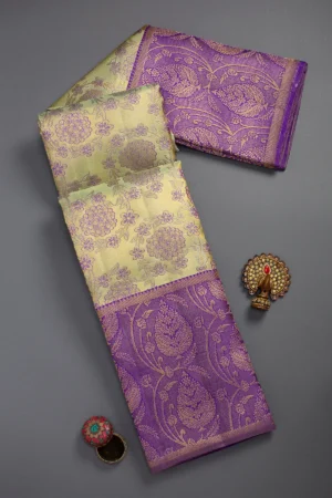 kanchipuram tissue saree in green & gold with royal purple border