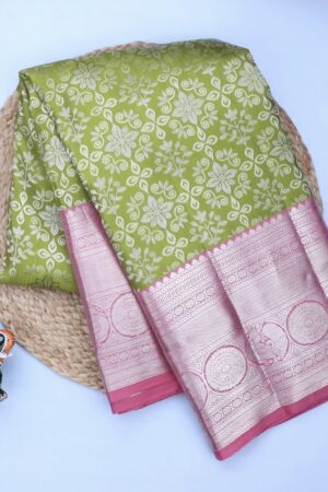 leaf green kanjivaram silk saree with pink zari border