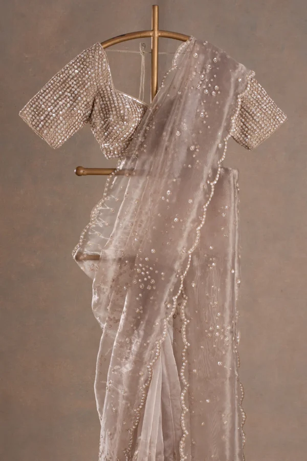 light beige glass tissue saree with sequins & pearl embroidery