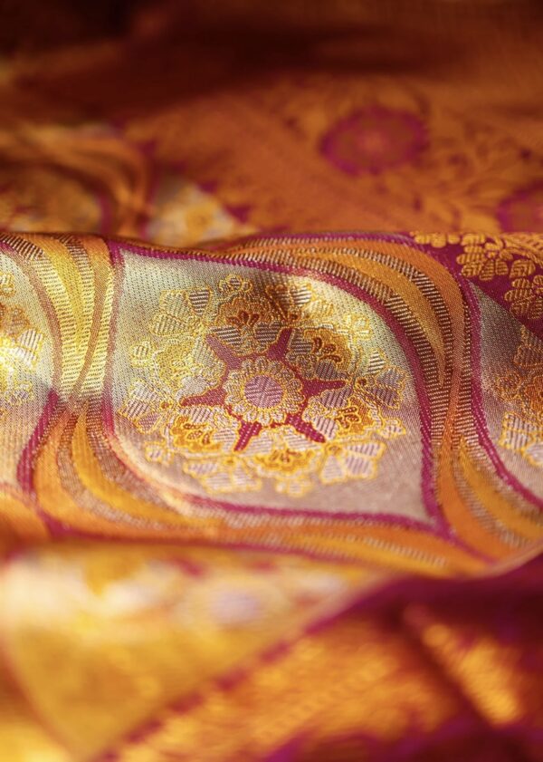 light gold kanjivaram silk saree with pink zari border