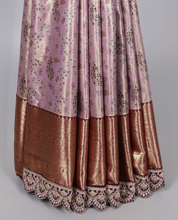 mauve purple semi tissue saree with patch embroidery border and floral motifs