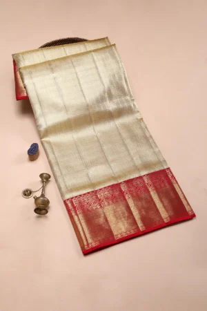 gold kanchipuram tissue saree with red & pink dual tone zari woven border