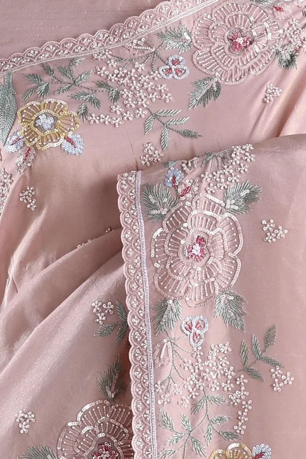 pale pink tissue saree with cutdana, sequins, & pearl embroidery