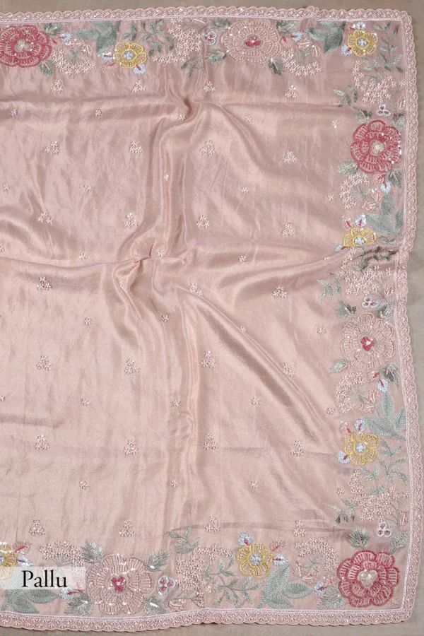 pale pink tissue saree with cutdana, sequins, & pearl embroidery