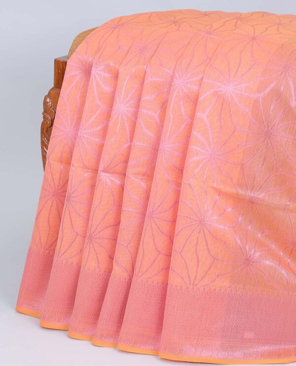 peach semi cotton saree with zari border and floral motifs