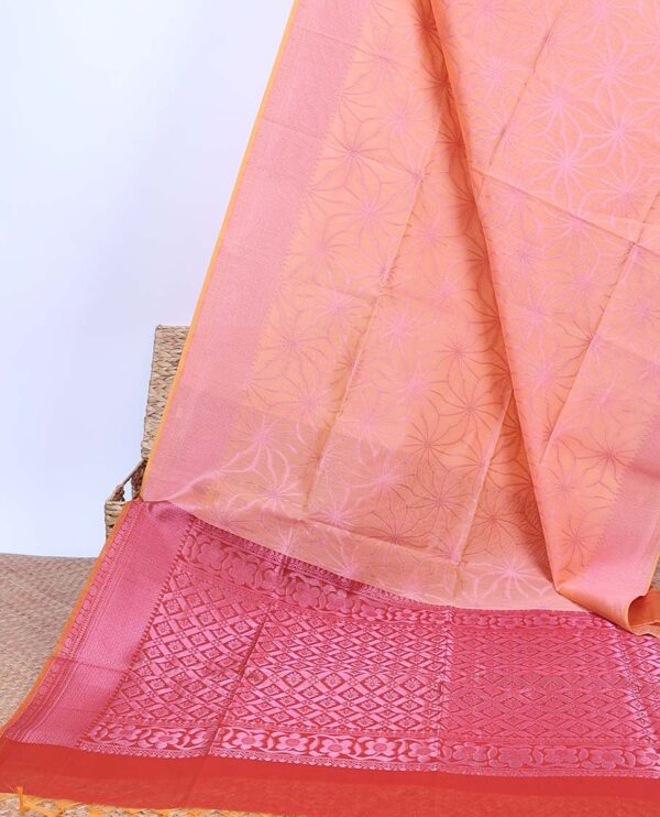 peach semi cotton saree with zari border and floral motifs