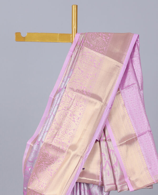 pink jacquard saree with traditional zari border and intricate pallu