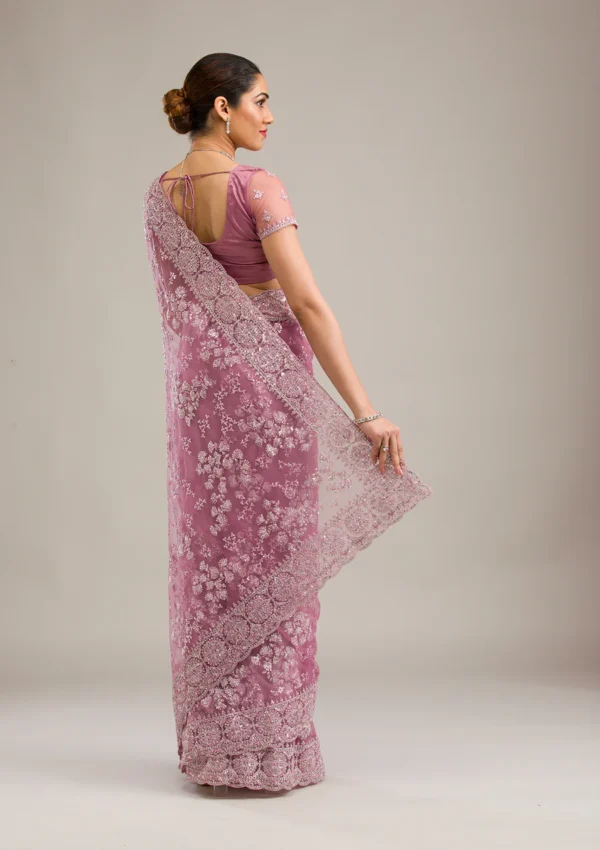 pink net saree with zari work and embroidery