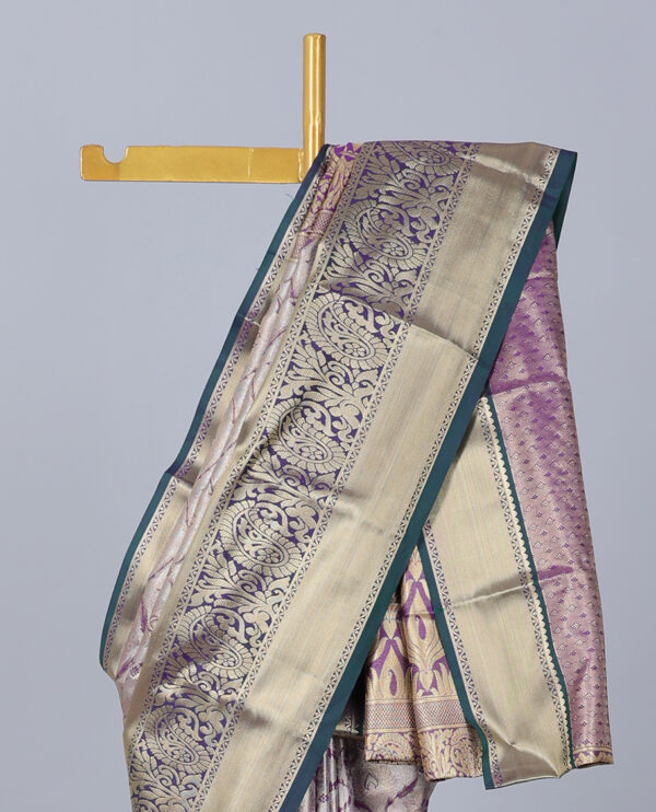 purple jacquard saree with contrast traditional border and intricate pallu