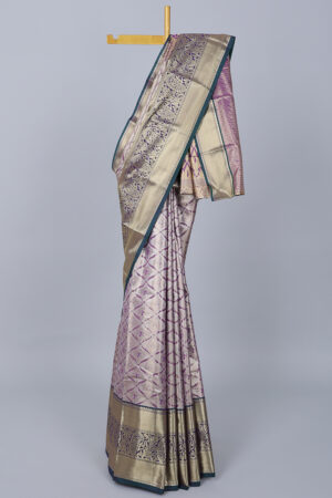 purple jacquard saree with contrast traditional border and intricate pallu