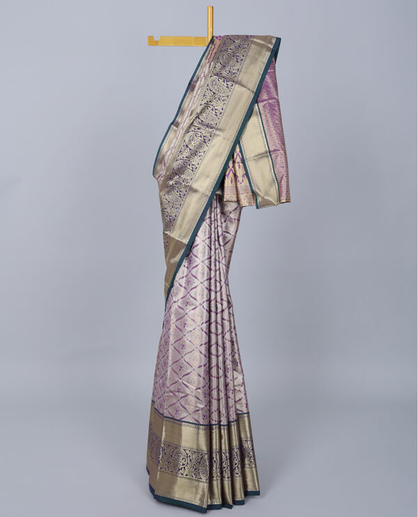 purple jacquard saree with contrast traditional border and intricate pallu