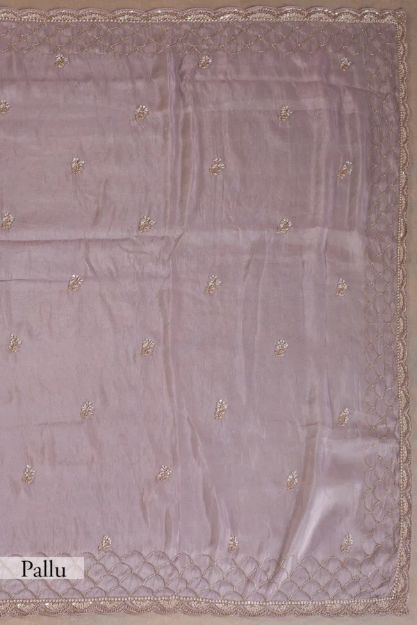 rhapsody purple tissue saree with gold embroidered border