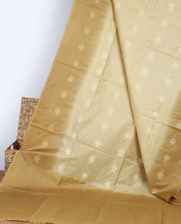 sandal linen cotton bhagalpuri saree with contrast striped border and thread buttas