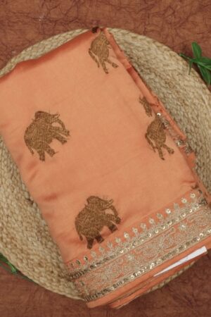 sunrise orange silk saree with elephant motif and intricate weaving