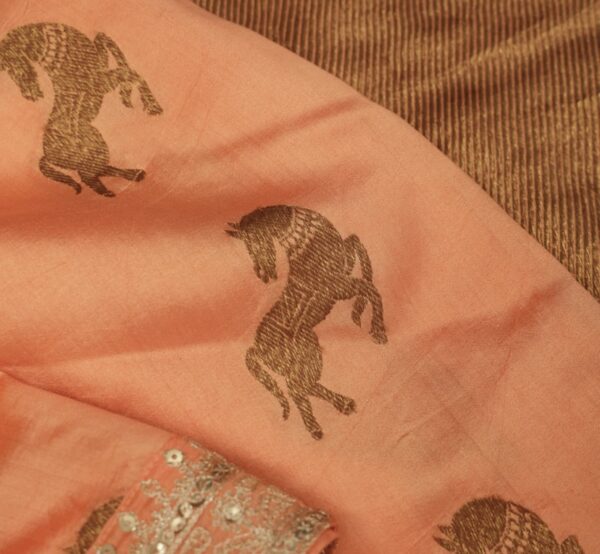 sunrise orange silk saree with elephant motif and intricate weaving