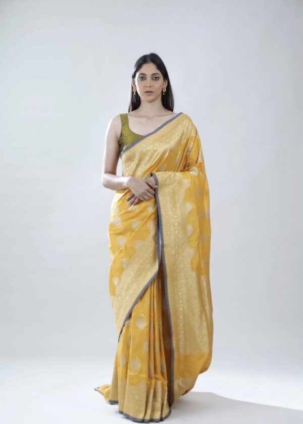 turmeric yellow banarasi silk saree with intricate zari weaving