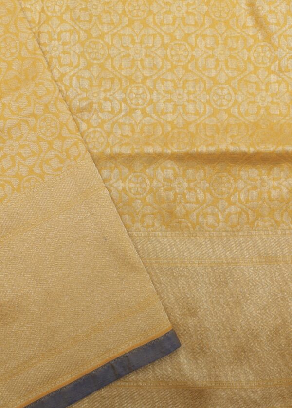 turmeric yellow banarasi silk saree with intricate zari weaving