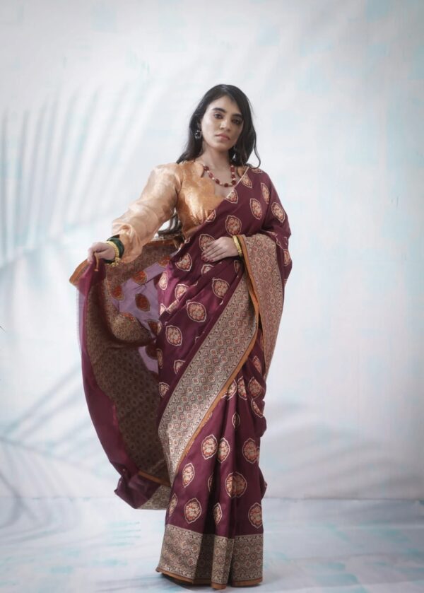 vermillion red banarasi silk saree with intricate border