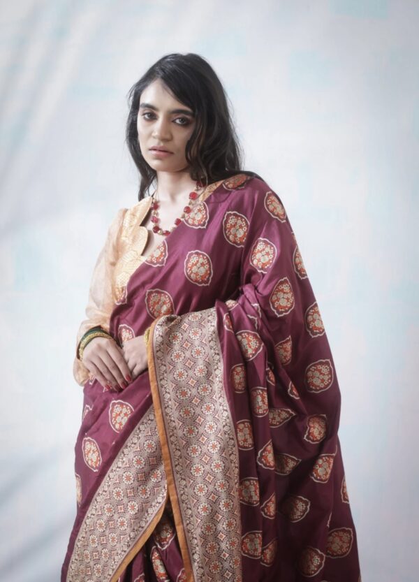 vermillion red banarasi silk saree with intricate border