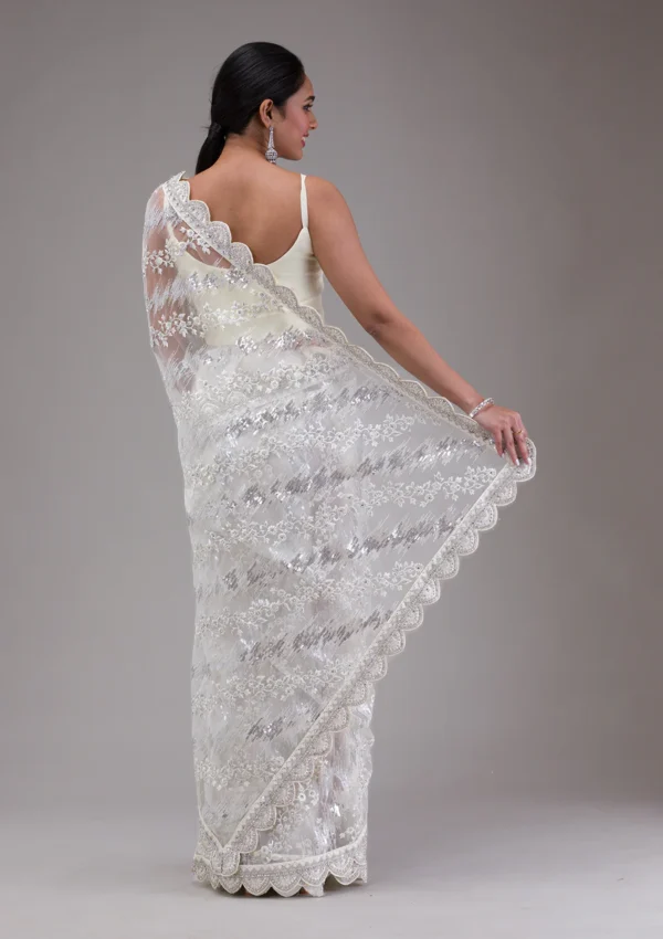 white net saree with sequins detailing