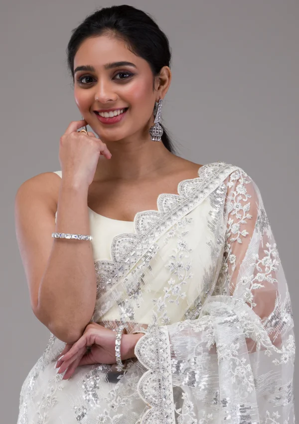 white net saree with sequins detailing