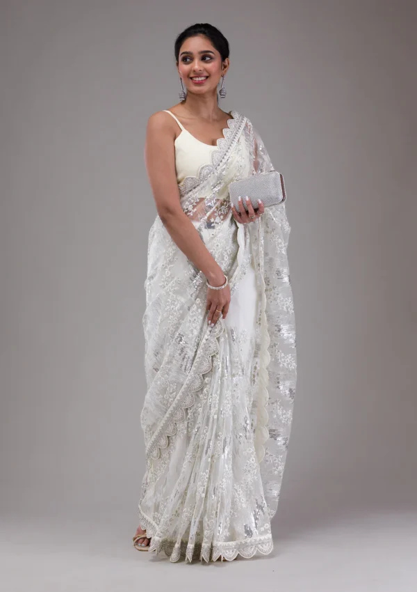 white net saree with sequins detailing