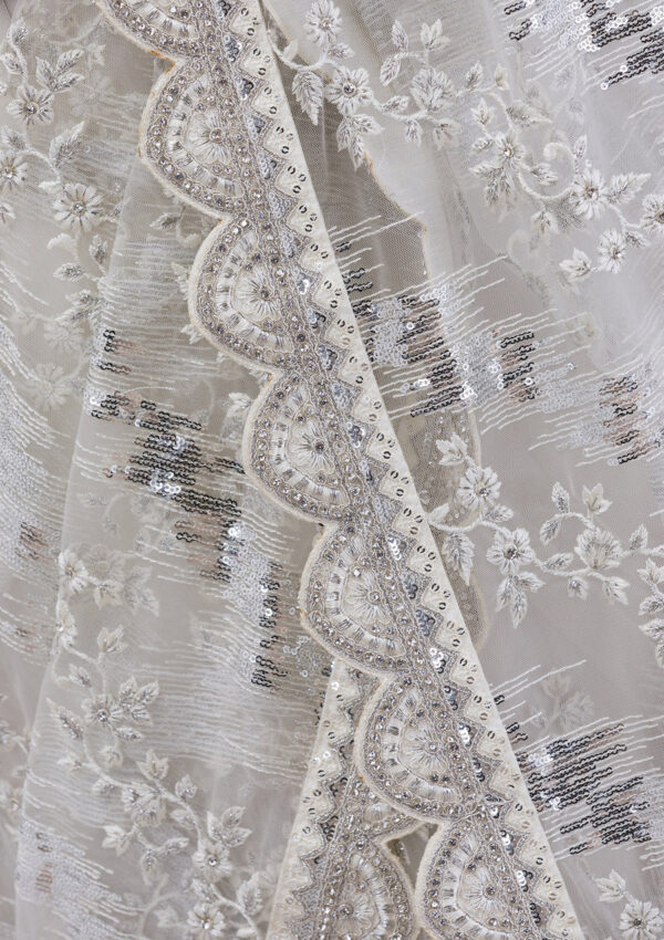 white net saree with sequins detailing